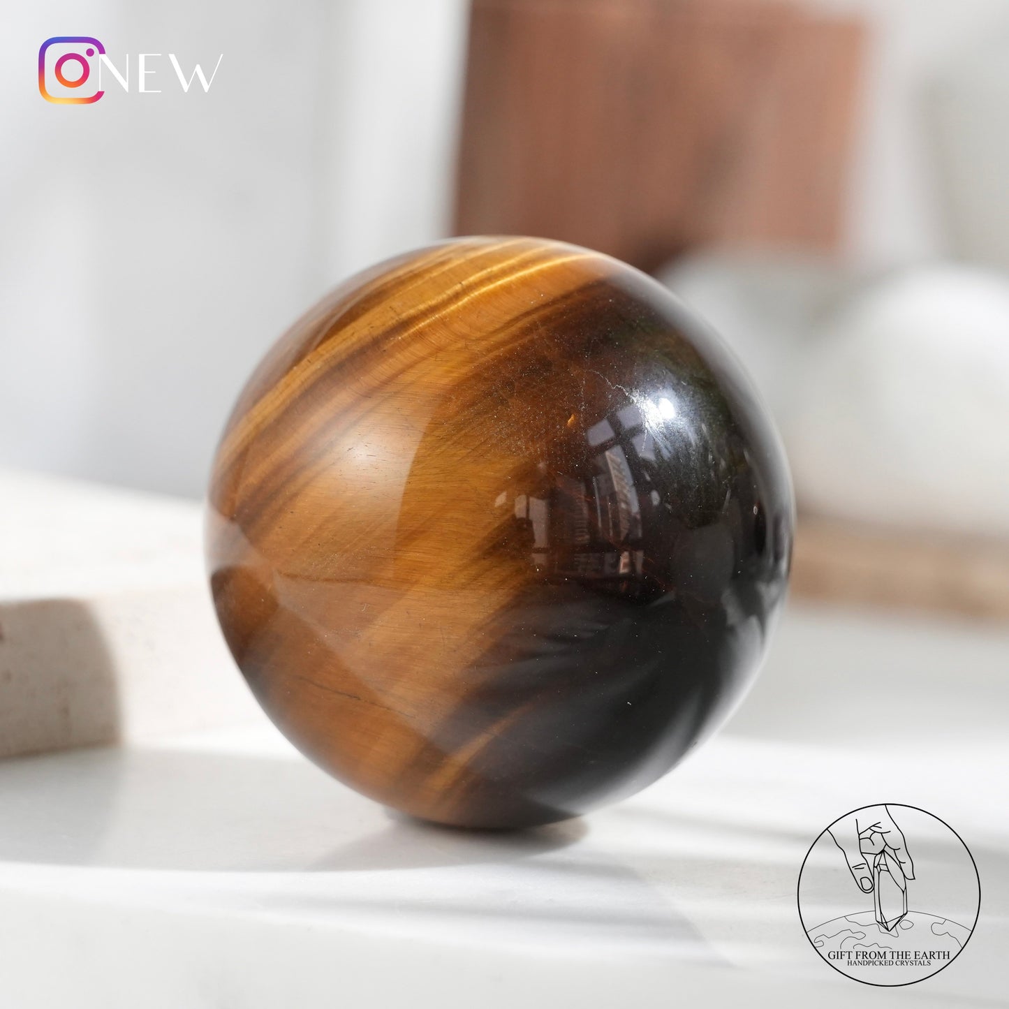 Yellow tiger's eye sphere