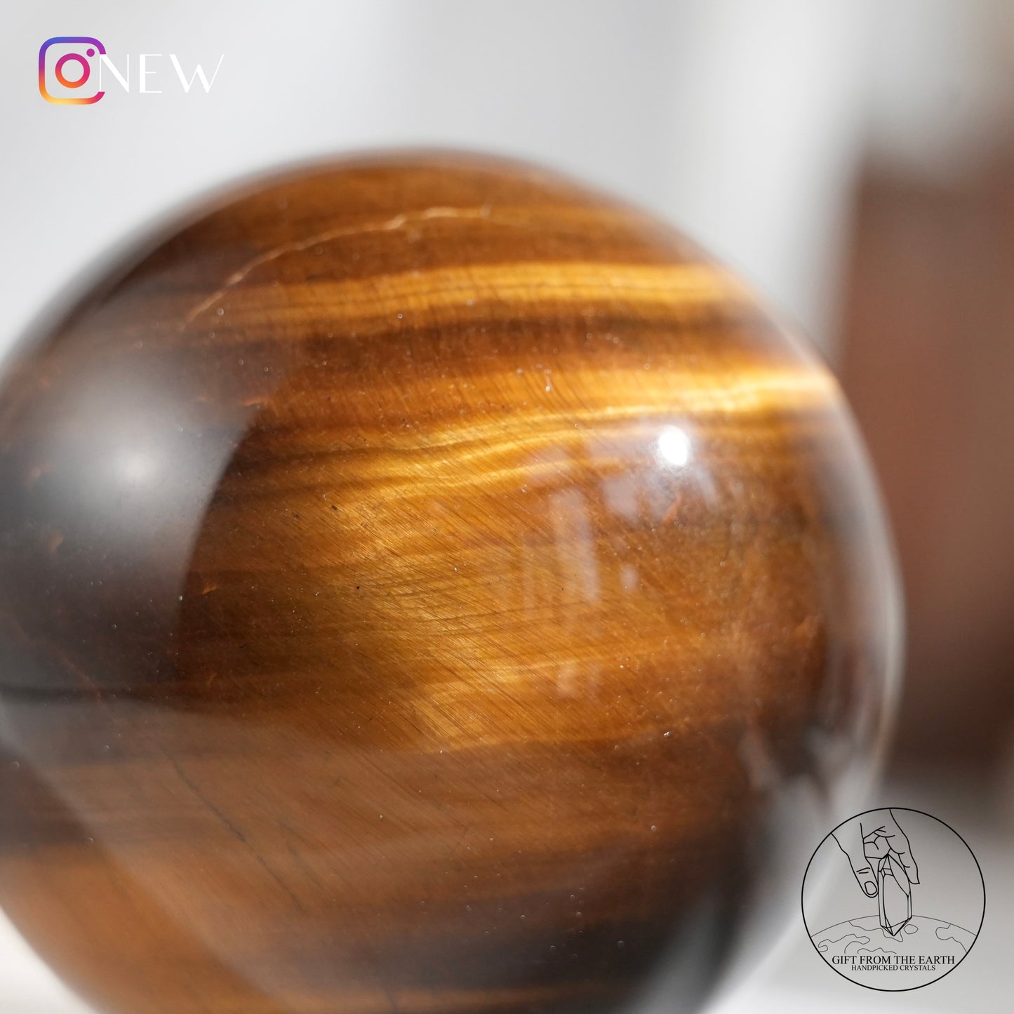 Yellow tiger's eye sphere