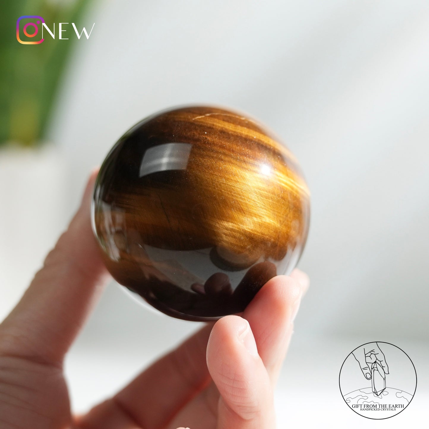 Yellow tiger's eye sphere