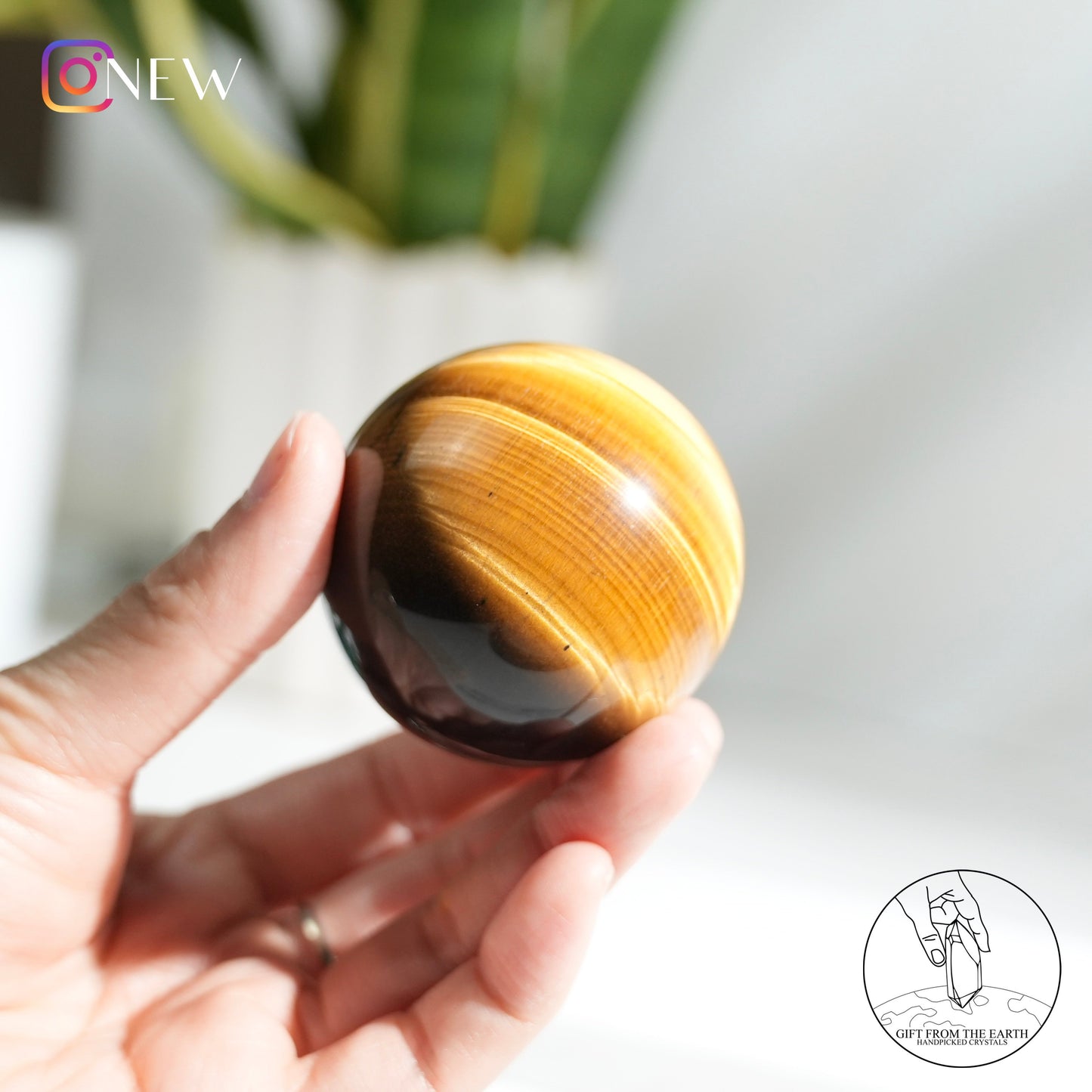 Yellow tiger's eye sphere