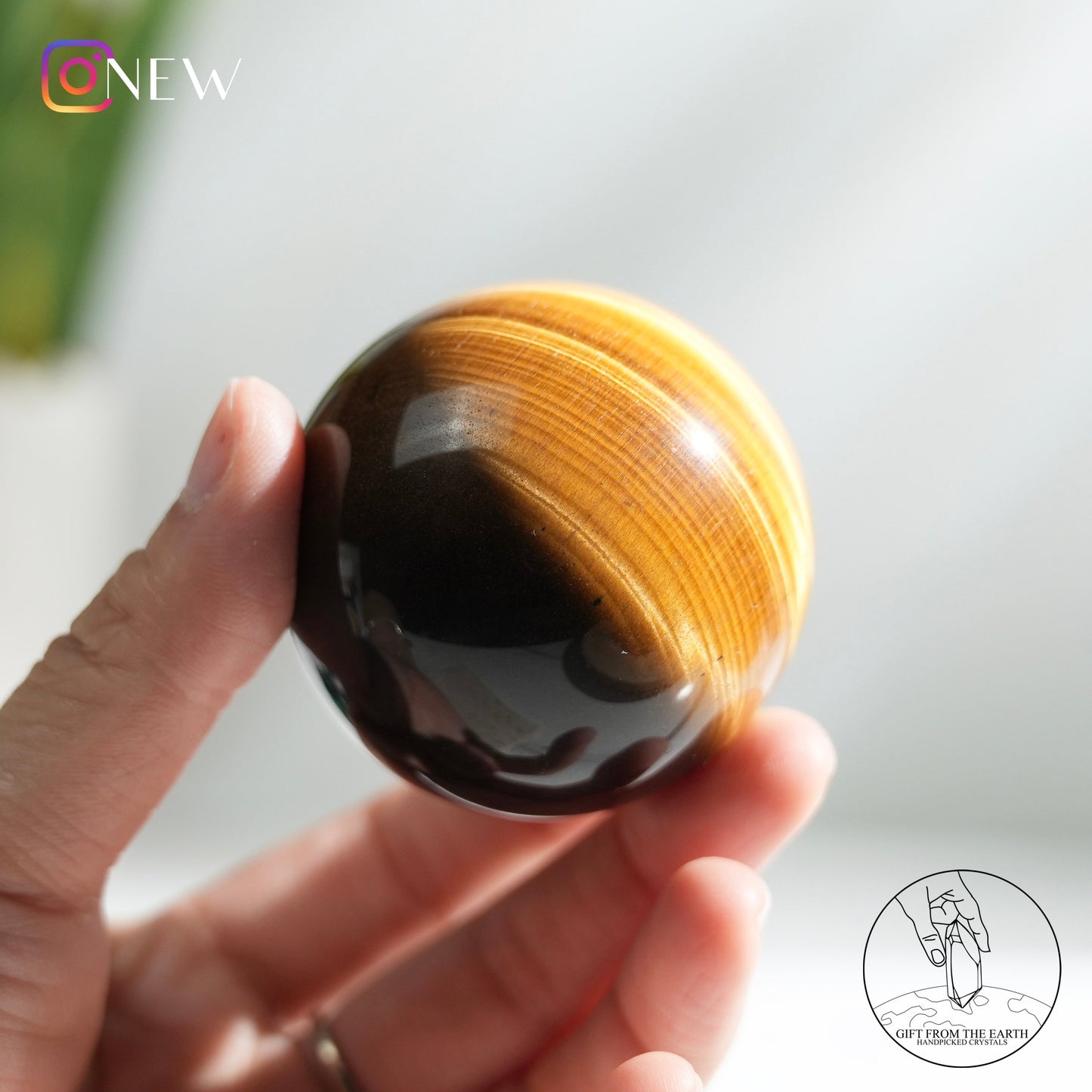 Yellow tiger's eye sphere