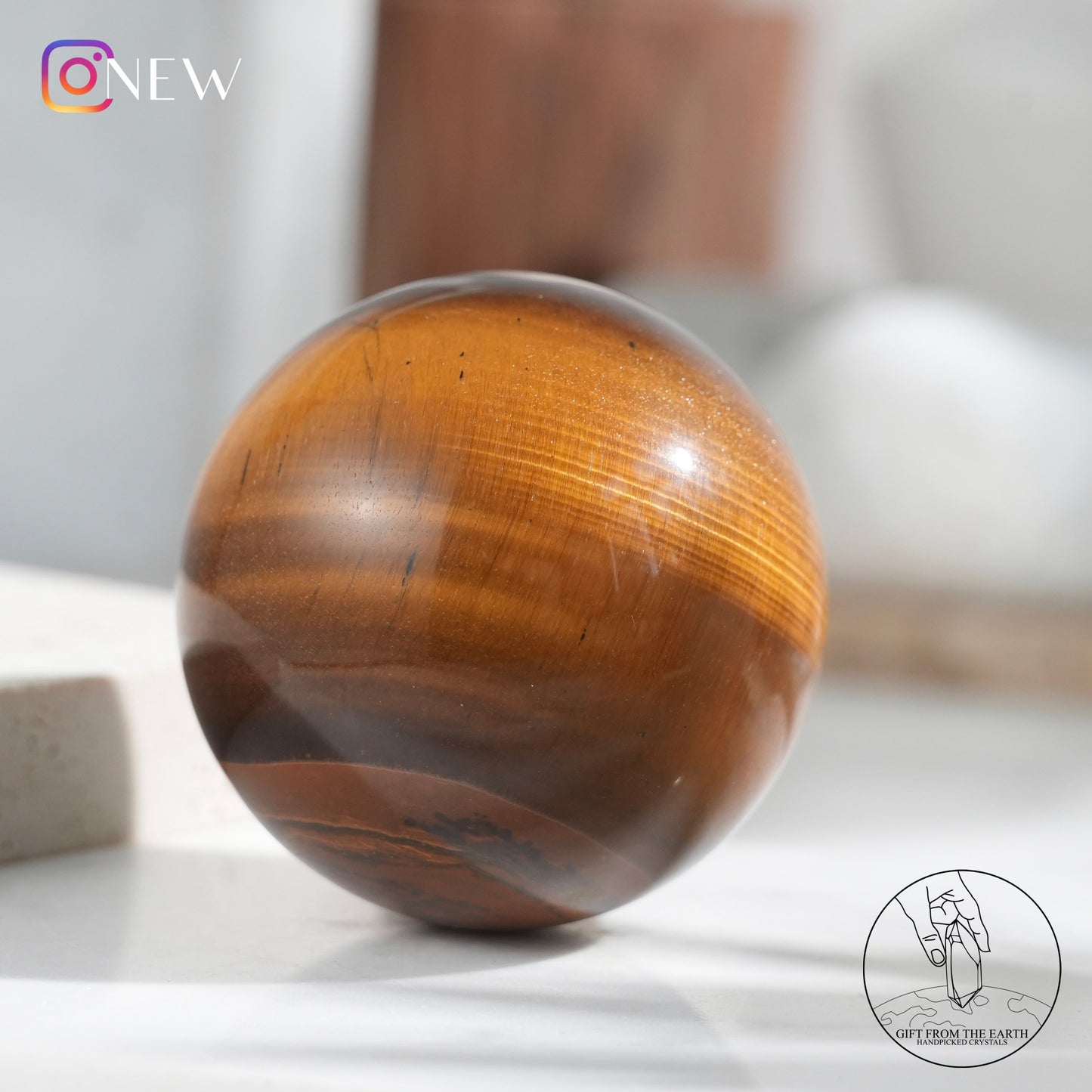 Yellow tiger's eye sphere