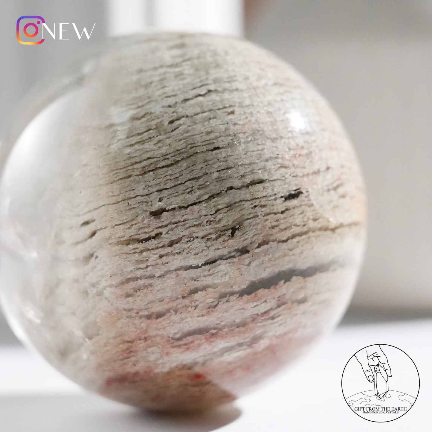 Multi-layered white phantom quartz sphere