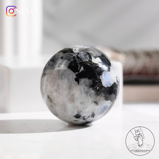 Indian white moonstone with black tourmaline sphere