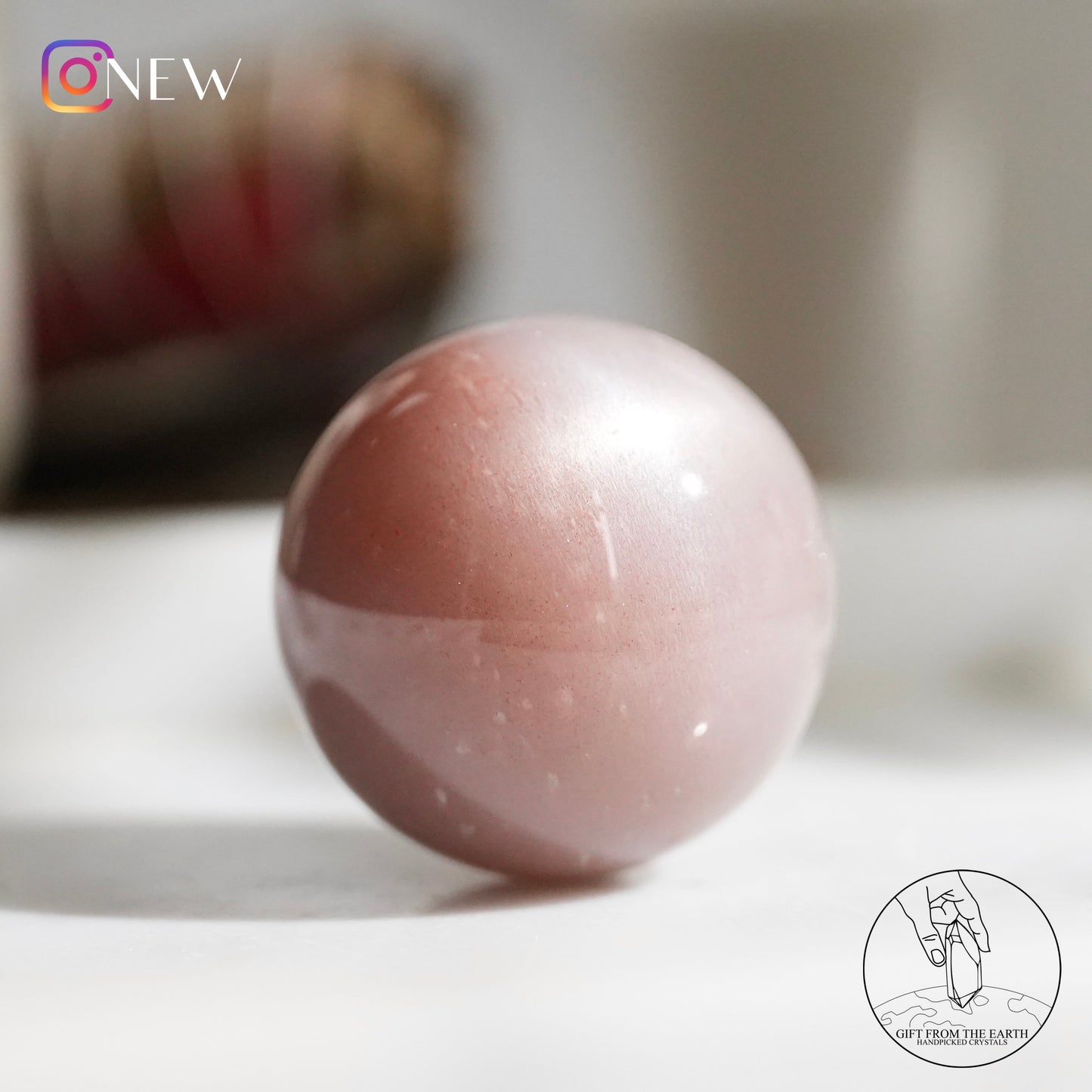 Orange moonstone sphere with sunstone