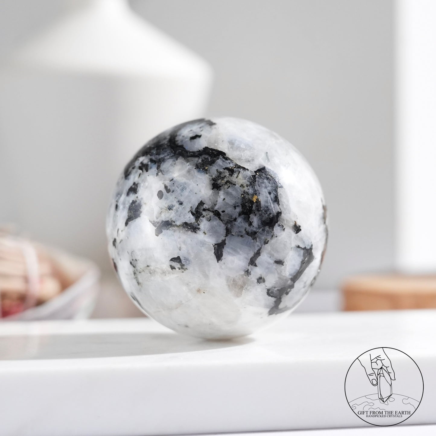 Indian white moonstone with black tourmaline sphere