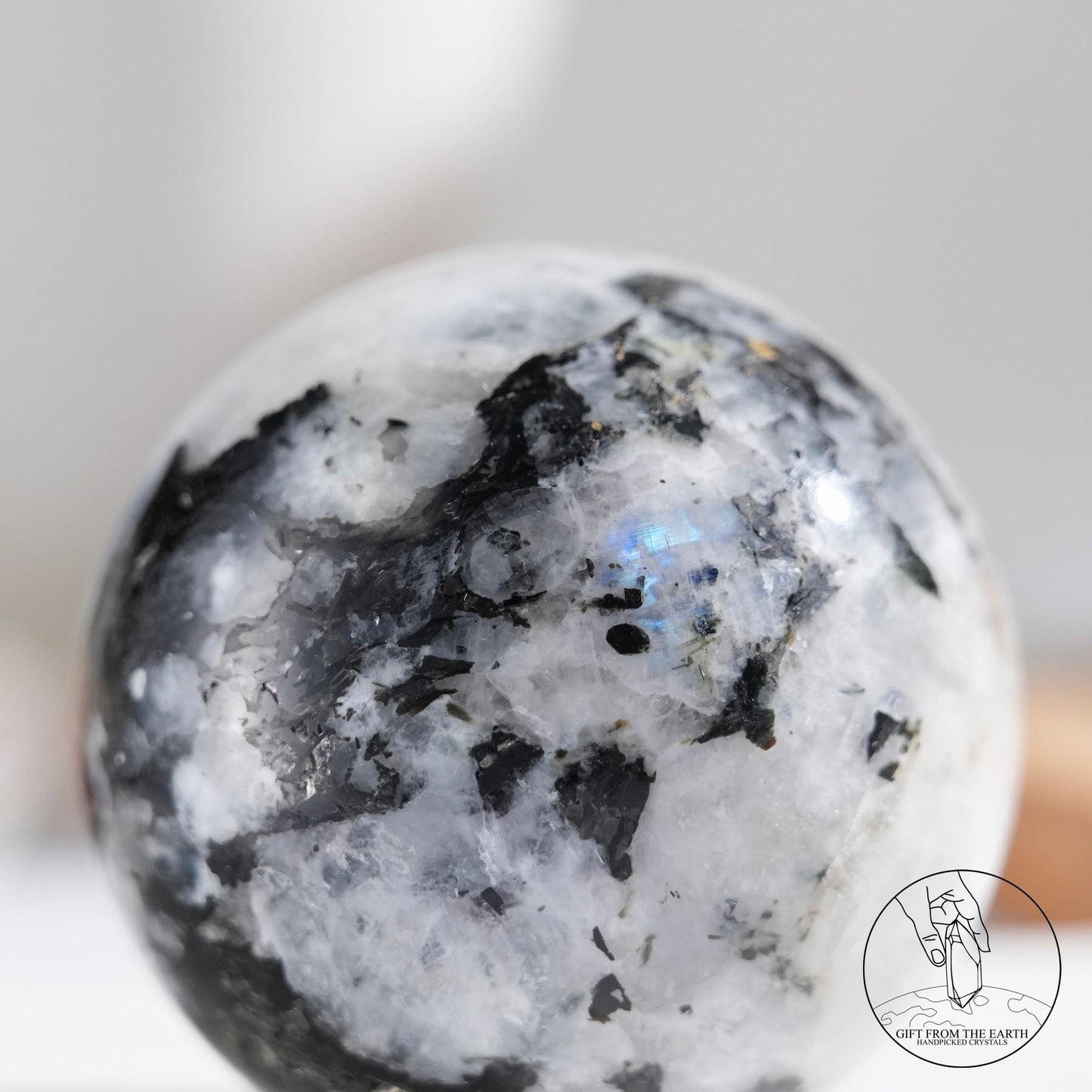 Indian white moonstone with black tourmaline sphere