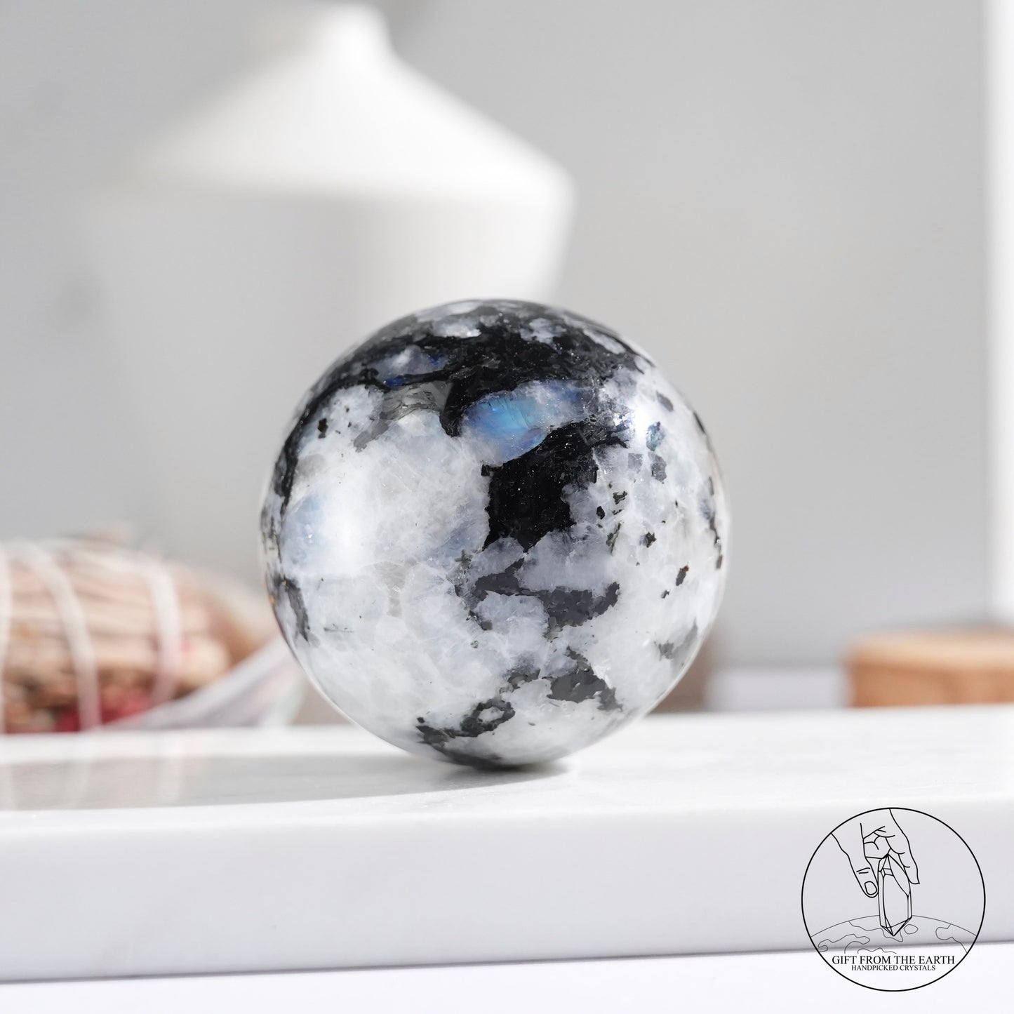 Indian white moonstone with black tourmaline sphere