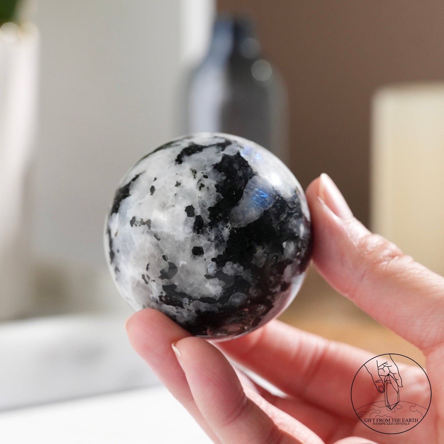 Indian white moonstone with black tourmaline sphere