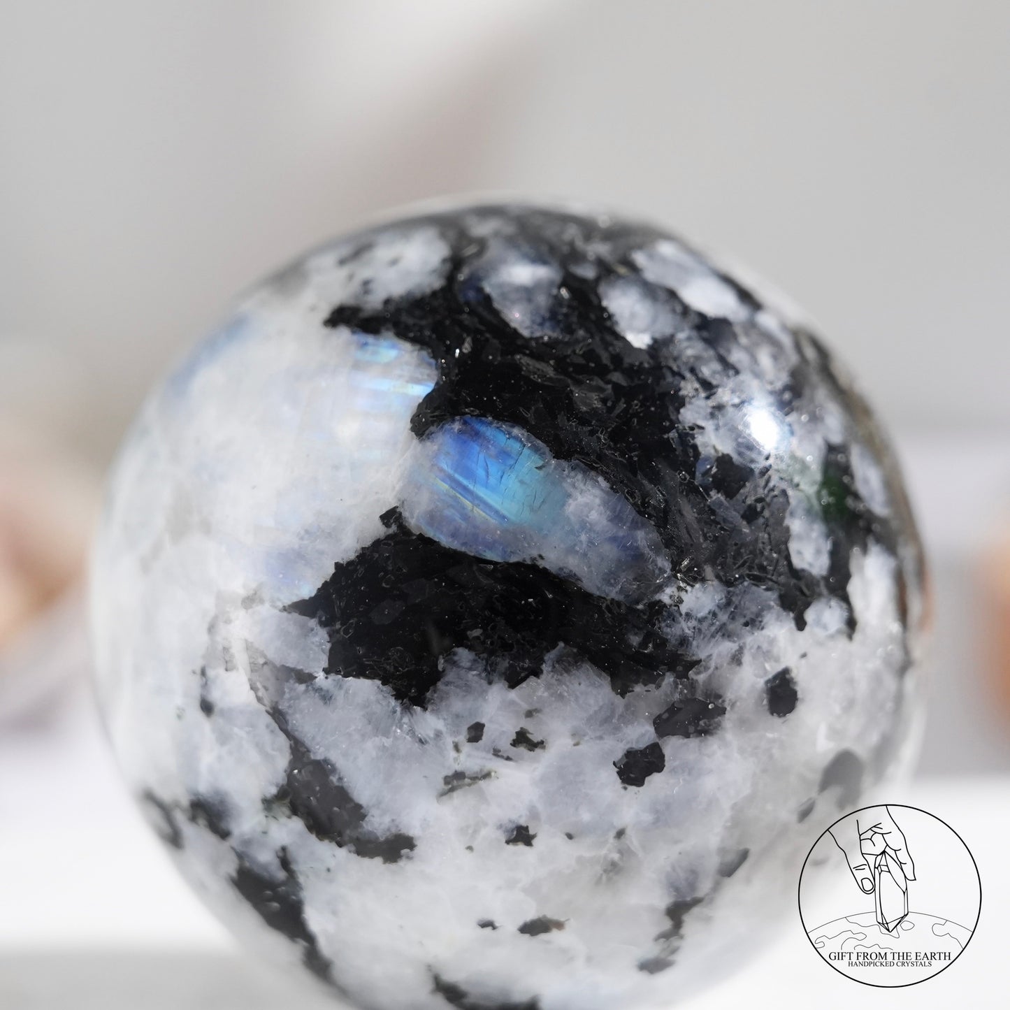 Indian white moonstone with black tourmaline sphere