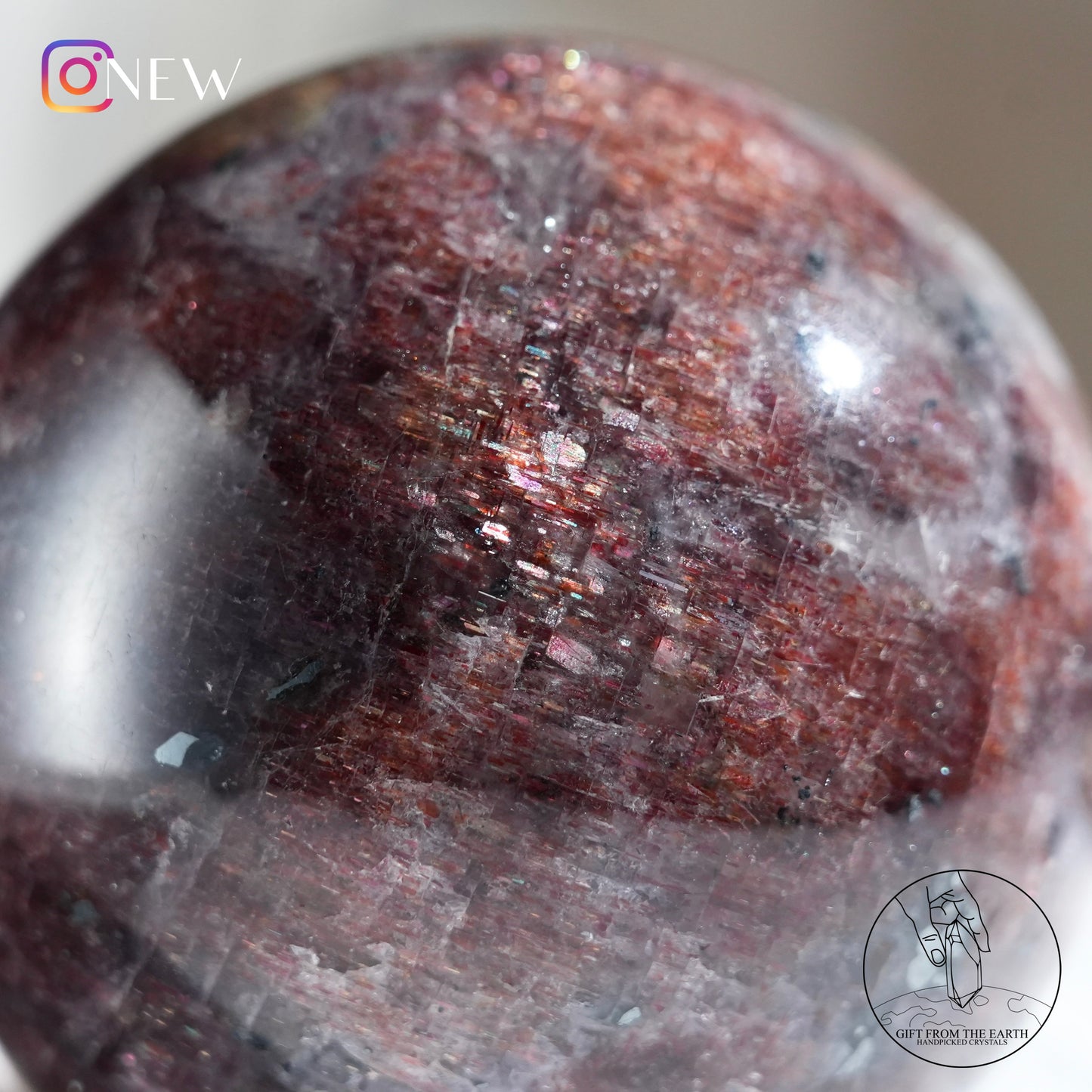 Iolite with stberry quartz sphere