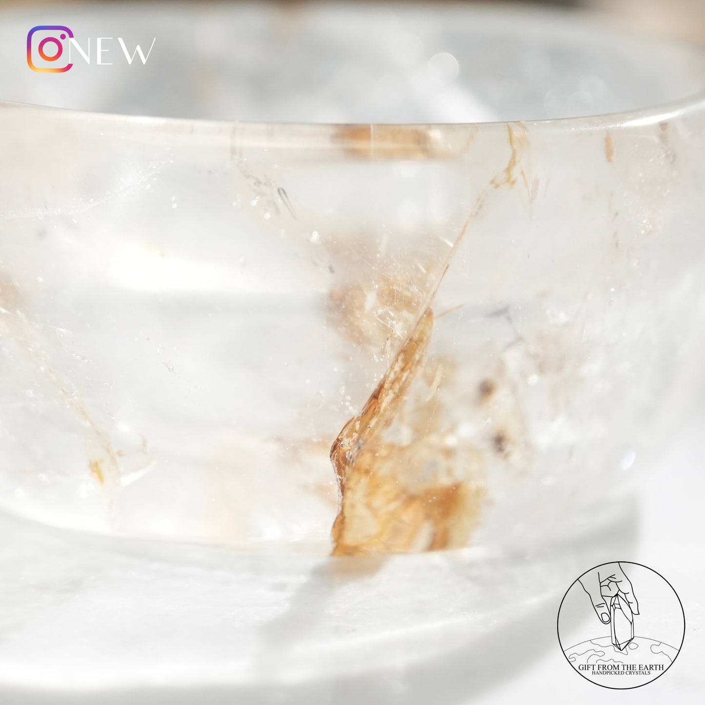 Clear quartz bowl with golden healer