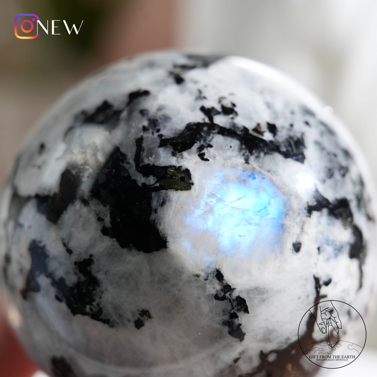 Indian white moonstone with black tourmaline sphere