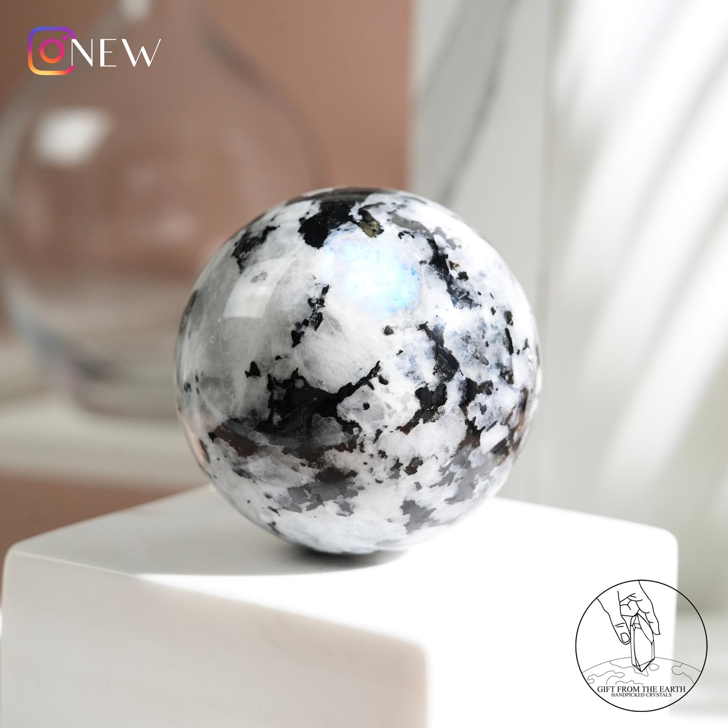 Indian white moonstone with black tourmaline sphere