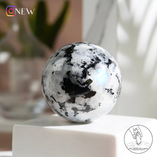 Indian white moonstone with black tourmaline sphere