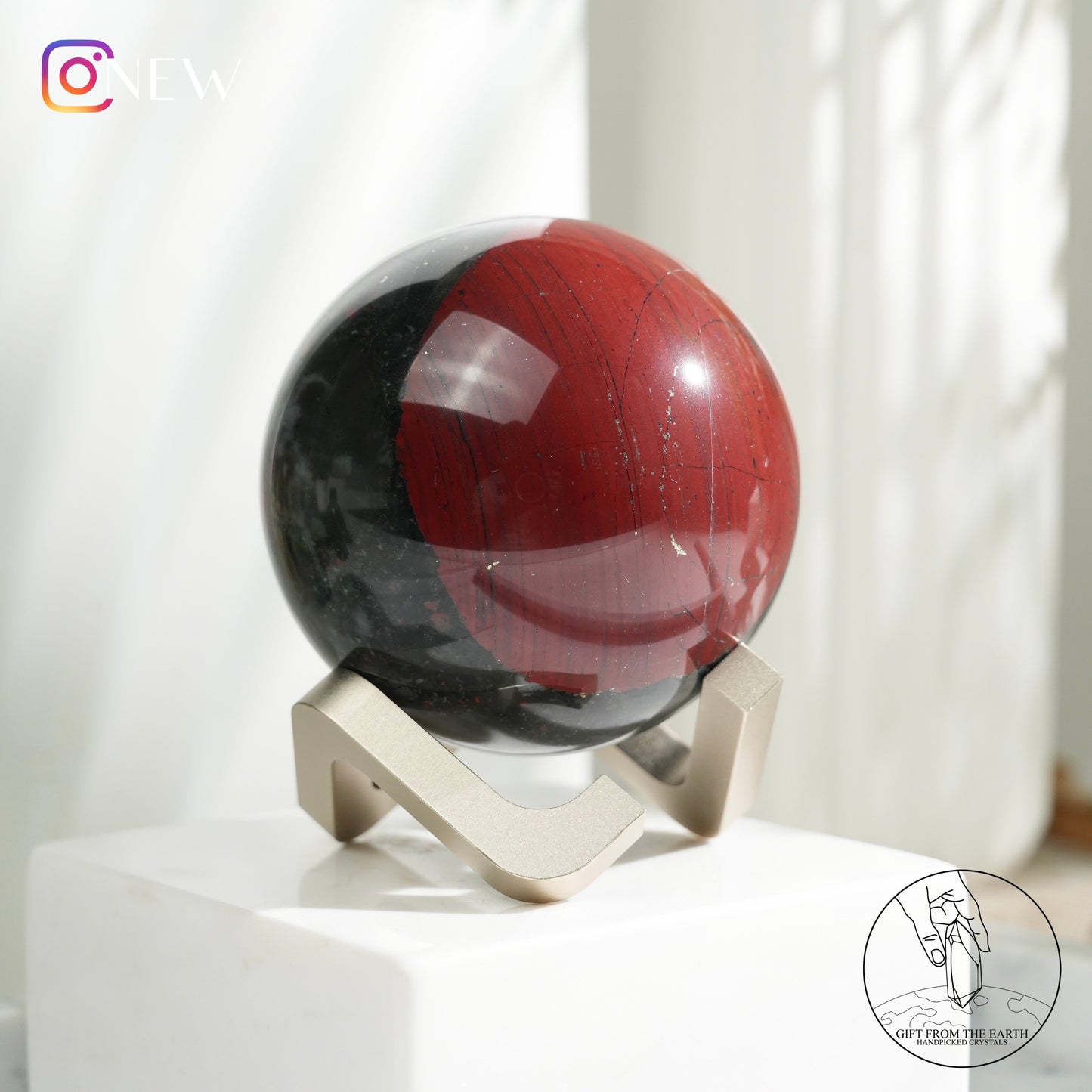 Bloodstone sphere with pyrite