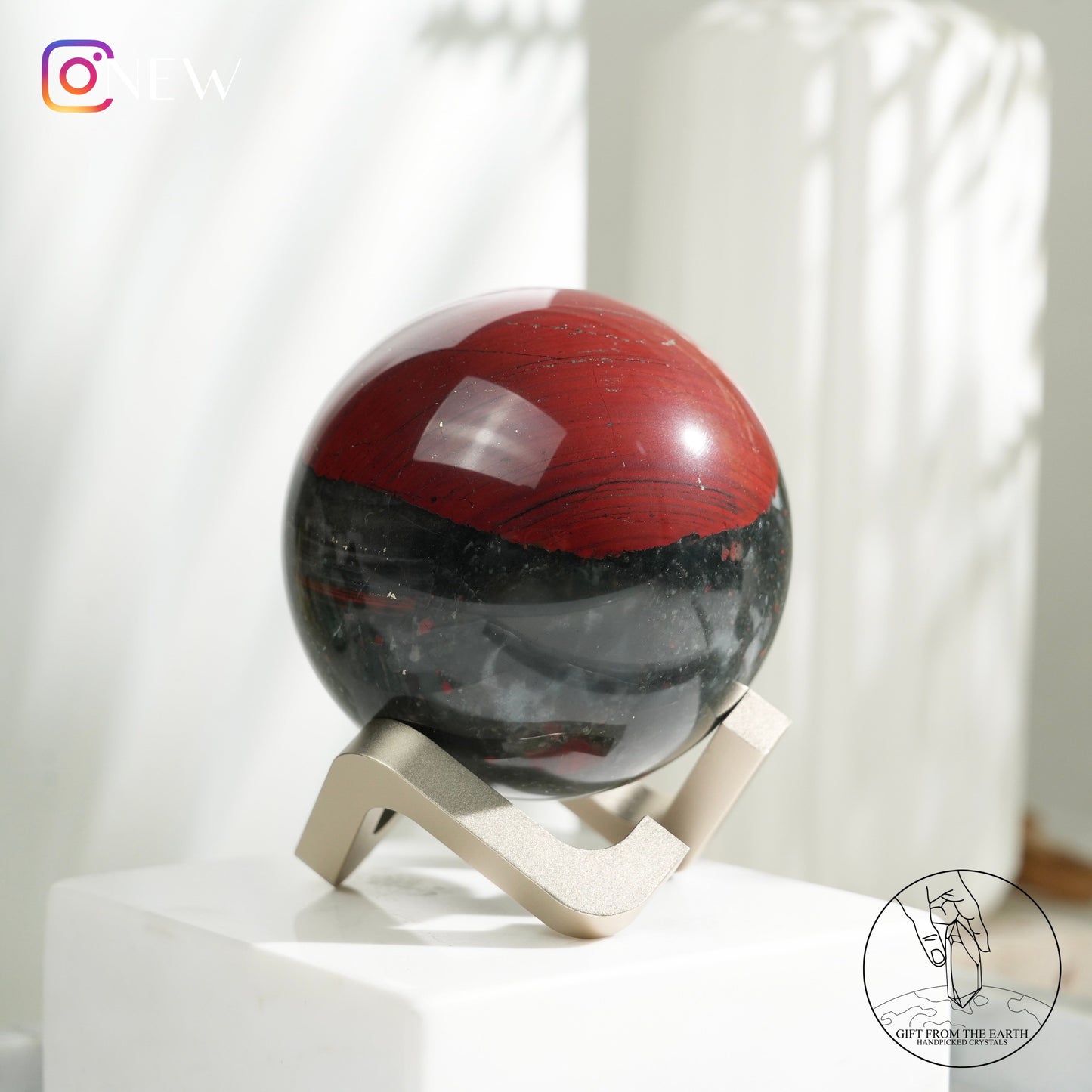 Bloodstone sphere with pyrite