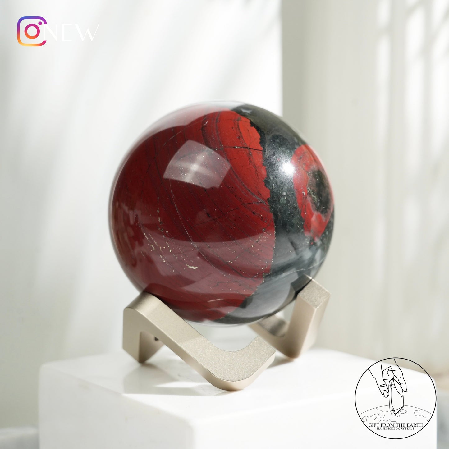 Bloodstone sphere with pyrite