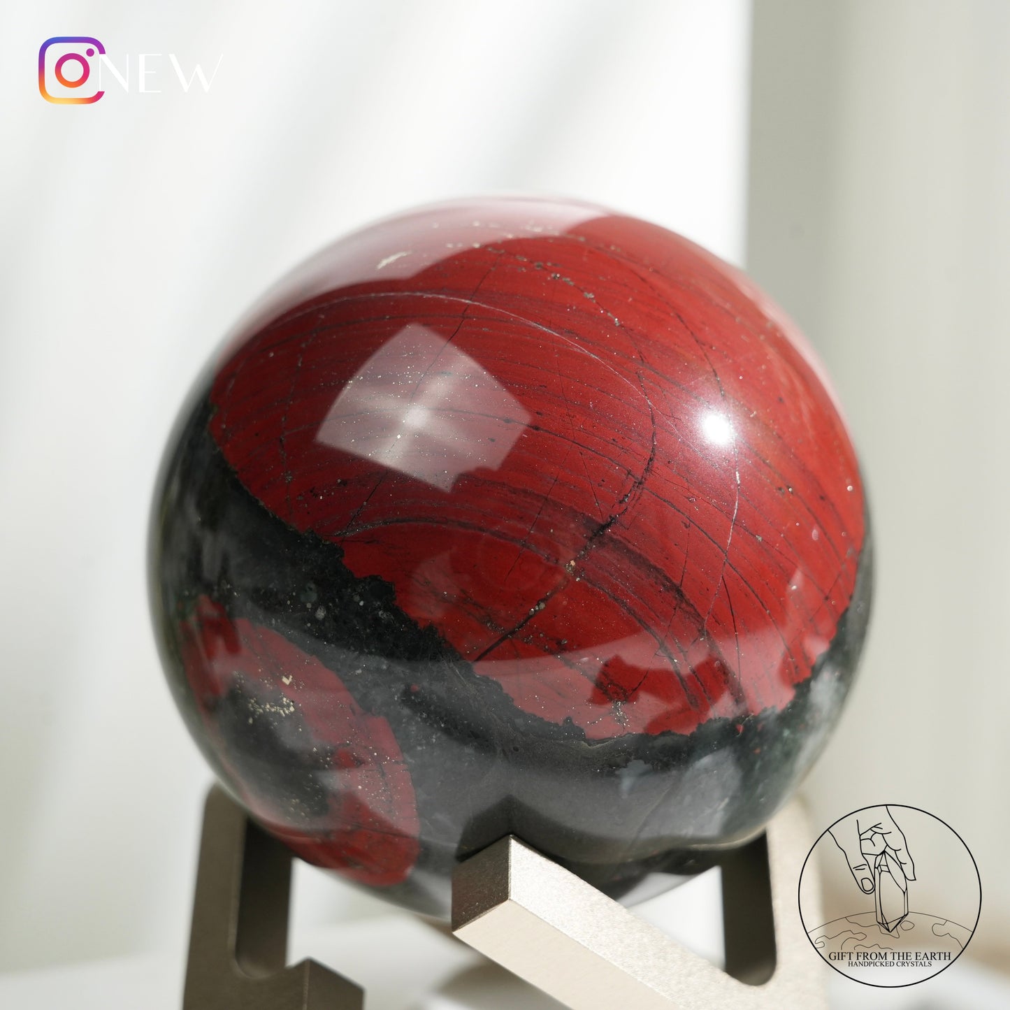 Bloodstone sphere with pyrite