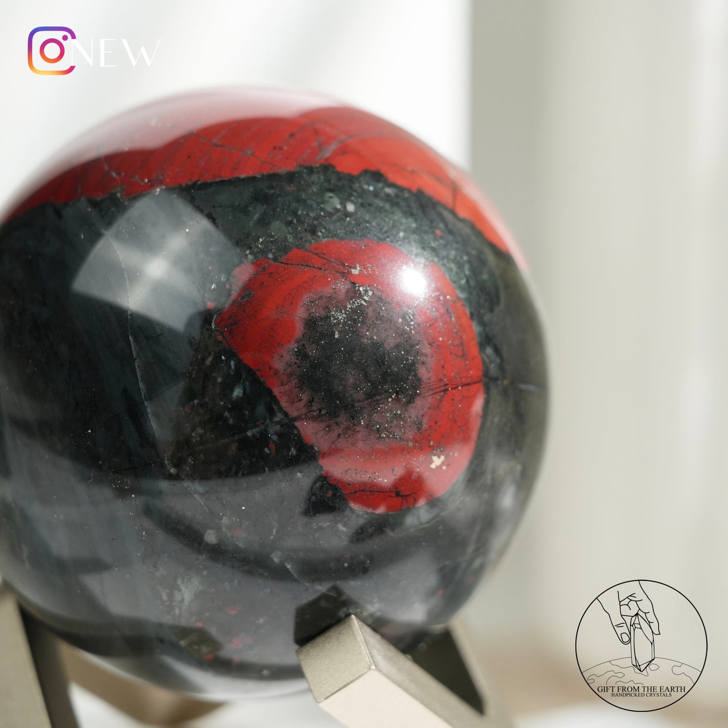 Bloodstone sphere with pyrite