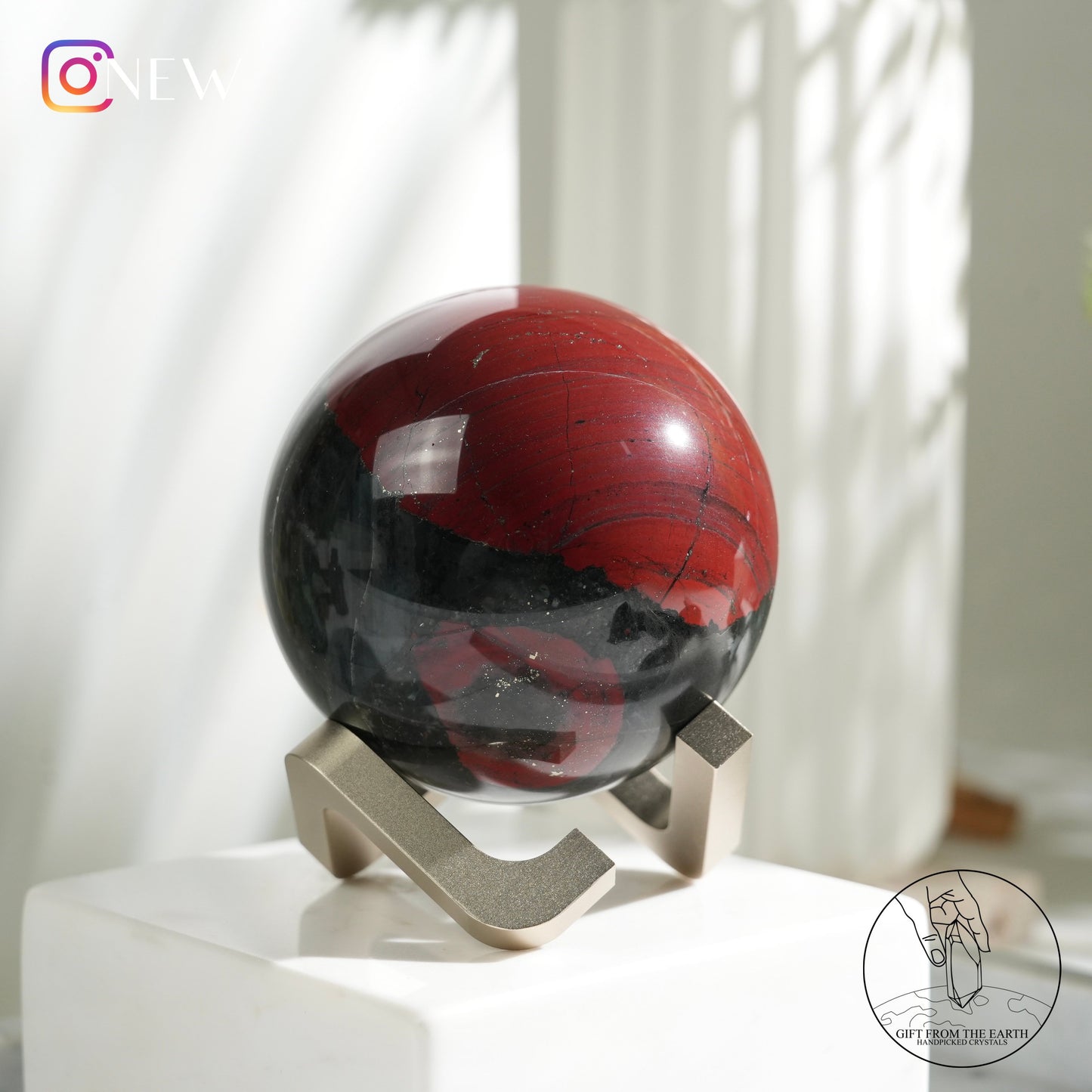 Bloodstone sphere with pyrite