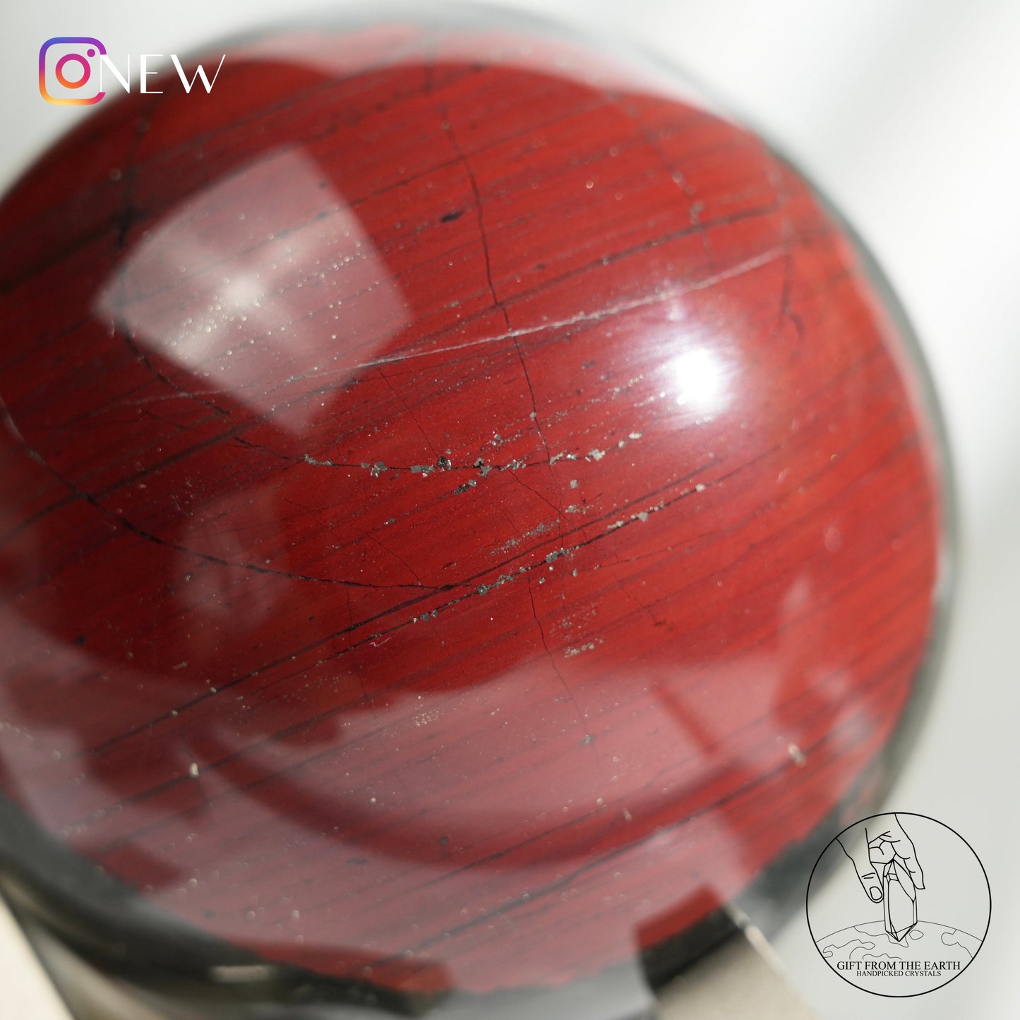 Bloodstone sphere with pyrite