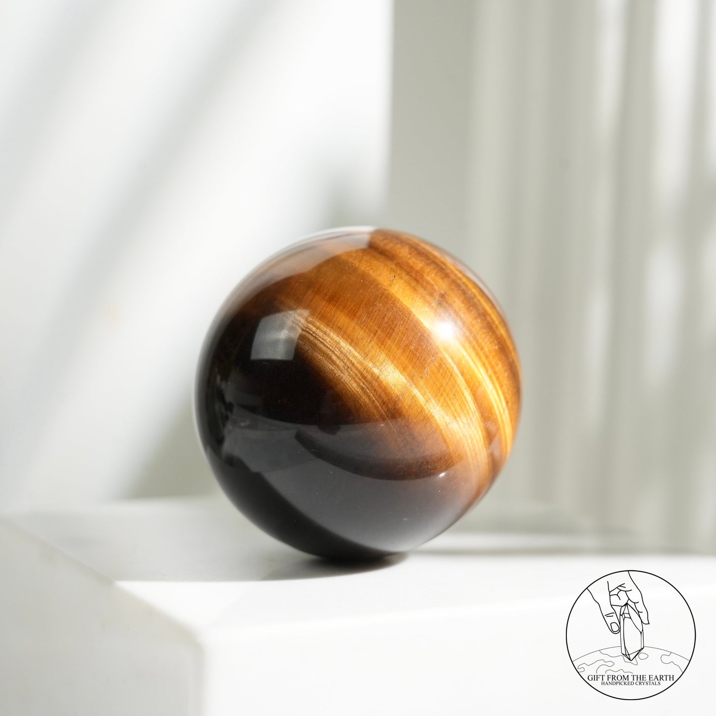 Yellow tiger's eye sphere