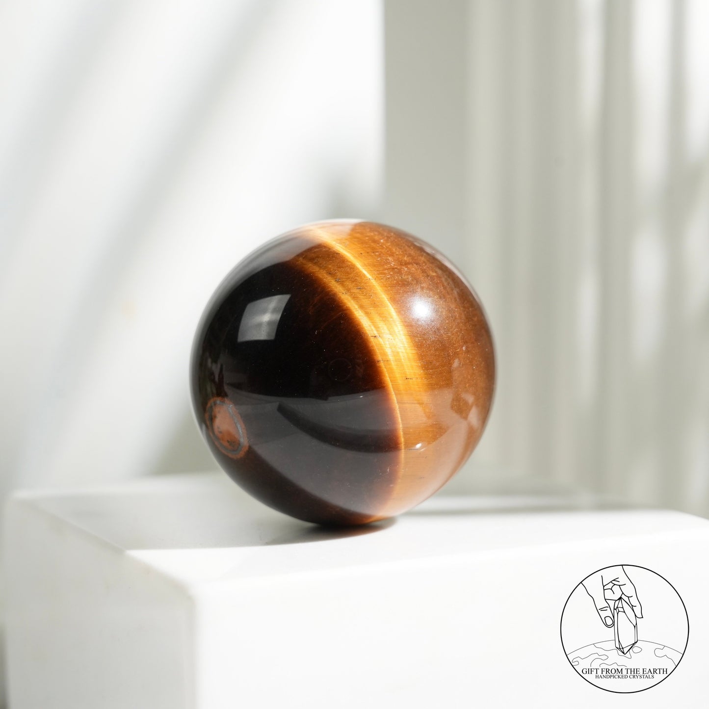 Yellow tiger's eye sphere