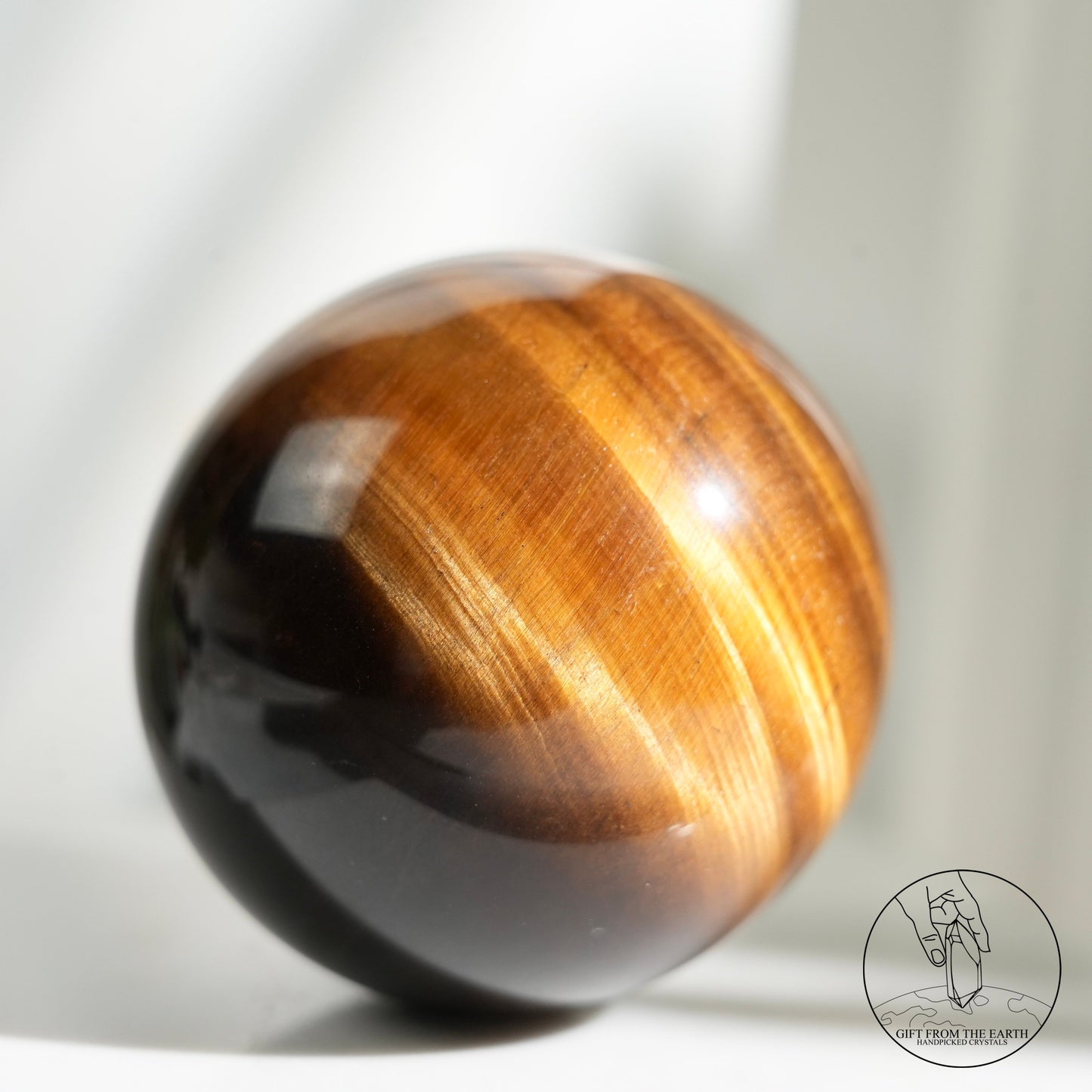 Yellow tiger's eye sphere