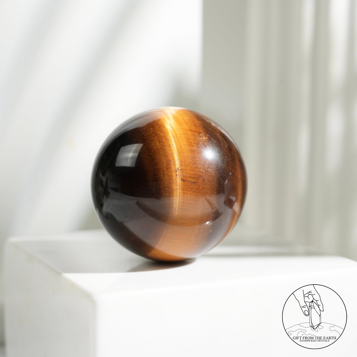 Yellow tiger's eye sphere