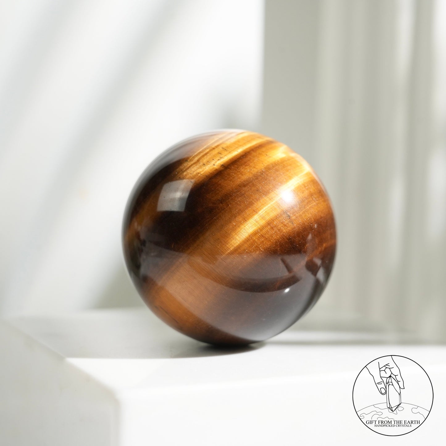 Yellow tiger's eye sphere