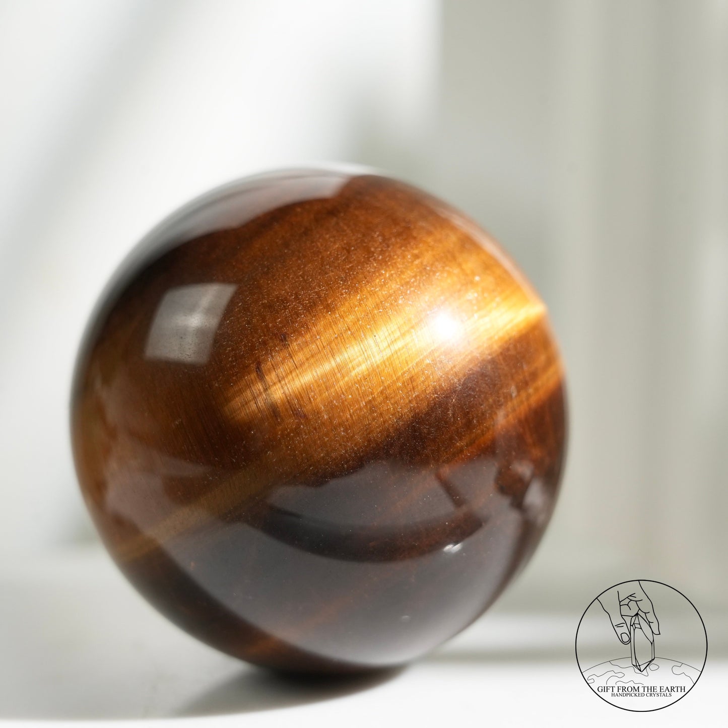 Yellow tiger's eye sphere