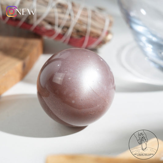 Orange moonstone sphere with sunstone