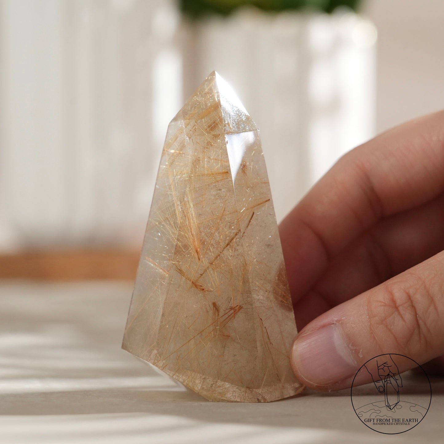 Golden rutilated quartz point