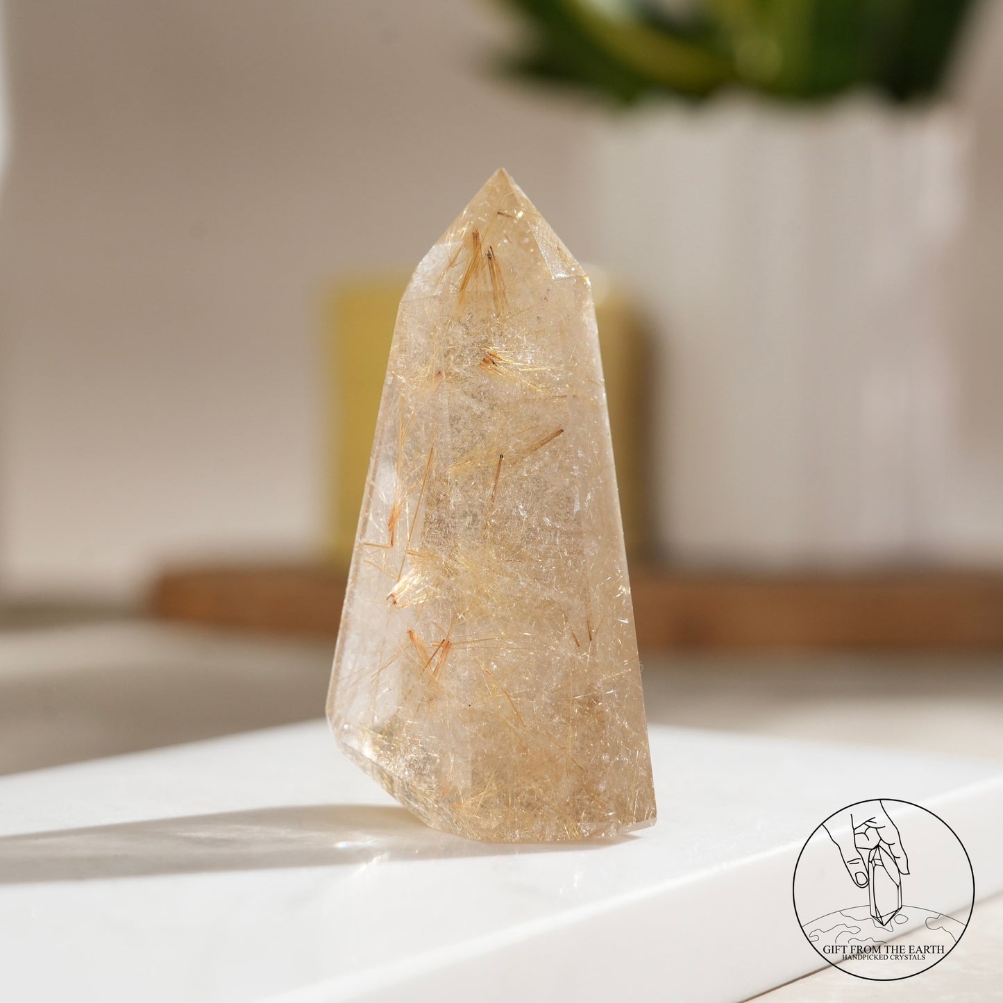 Golden rutilated quartz point