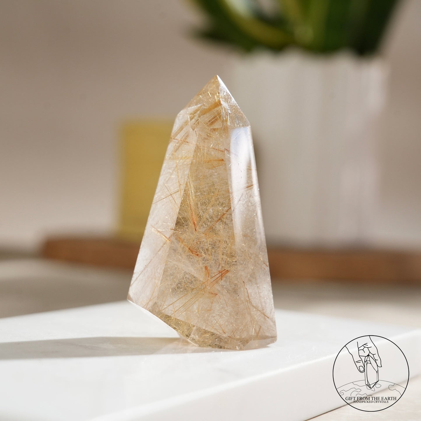 Golden rutilated quartz point