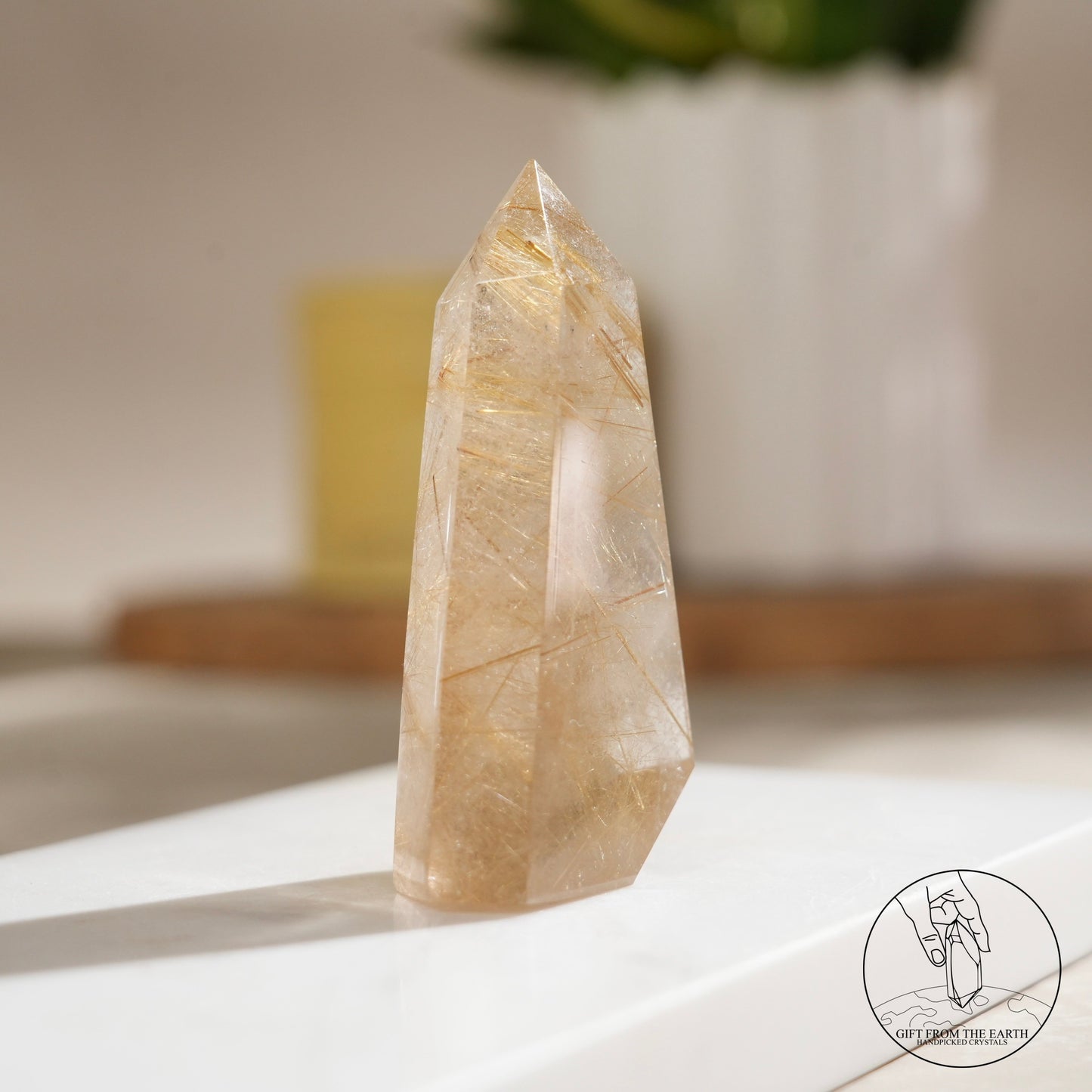 Golden rutilated quartz point