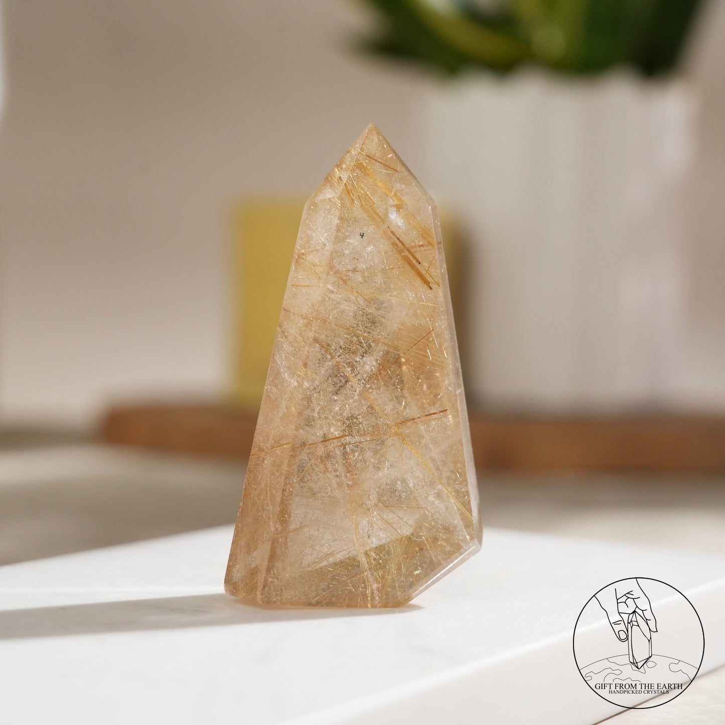 Golden rutilated quartz point