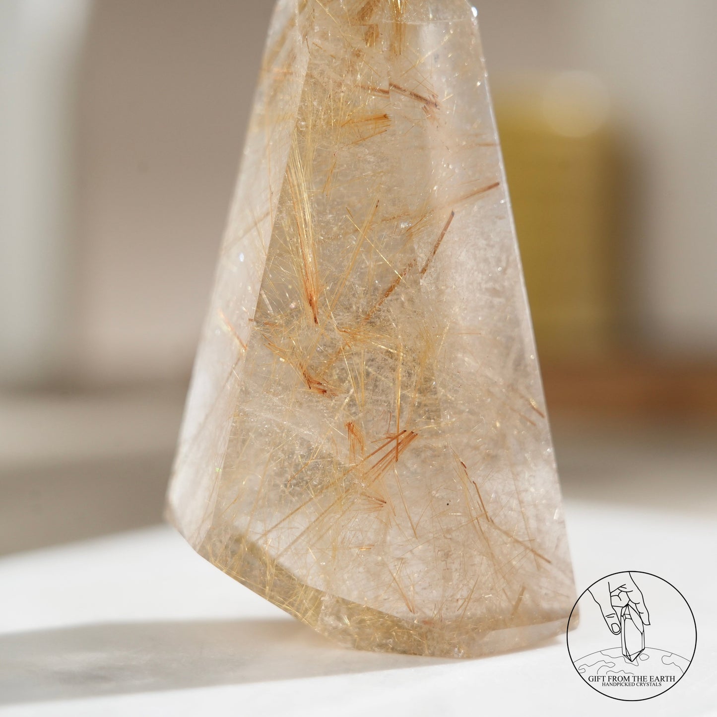 Golden rutilated quartz point