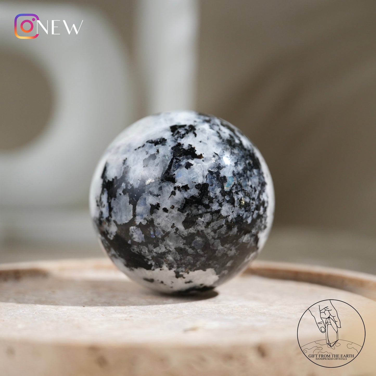 Indian white moonstone with black tourmaline sphere