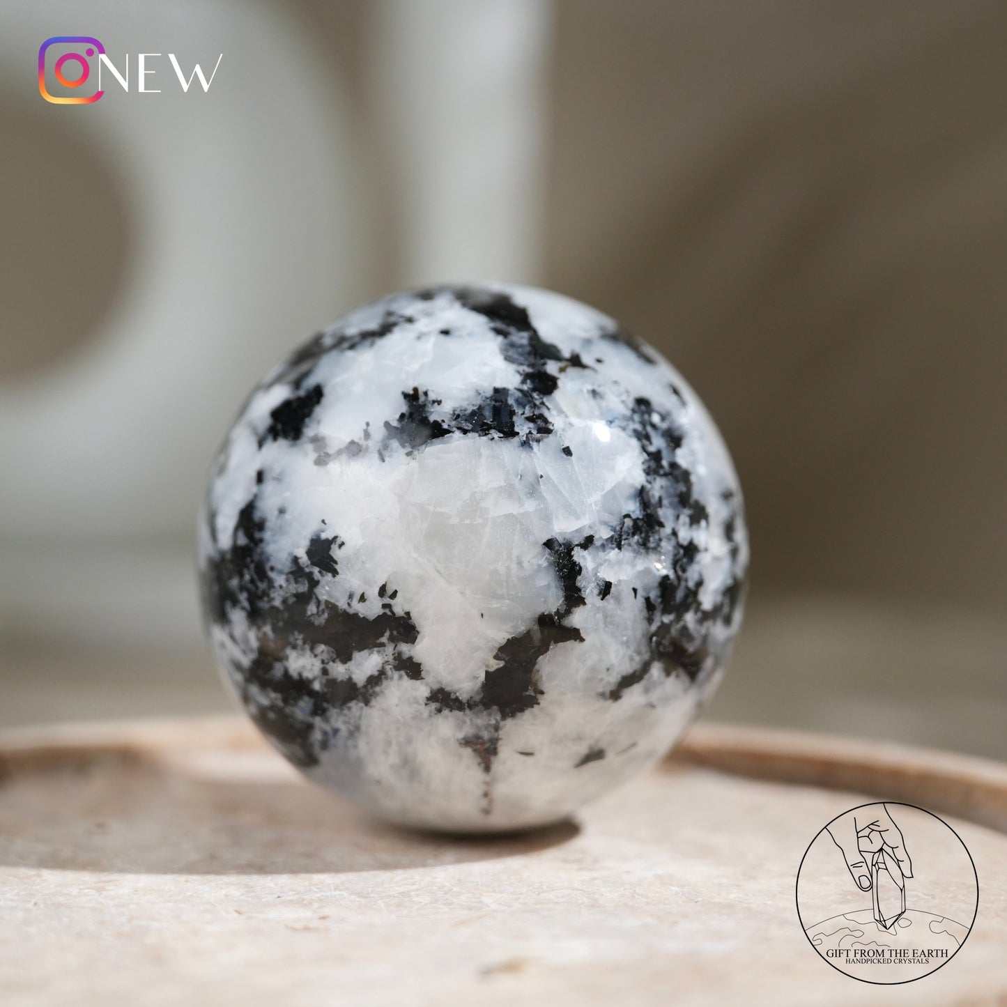 Indian white moonstone with black tourmaline sphere