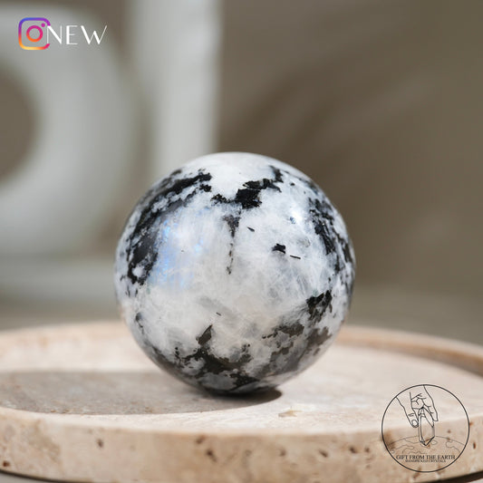 Indian white moonstone with black tourmaline sphere