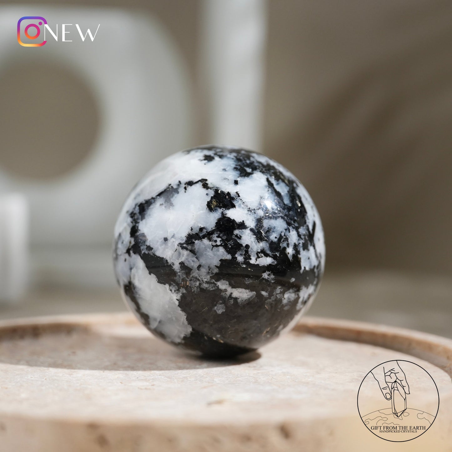 Indian white moonstone with black tourmaline sphere