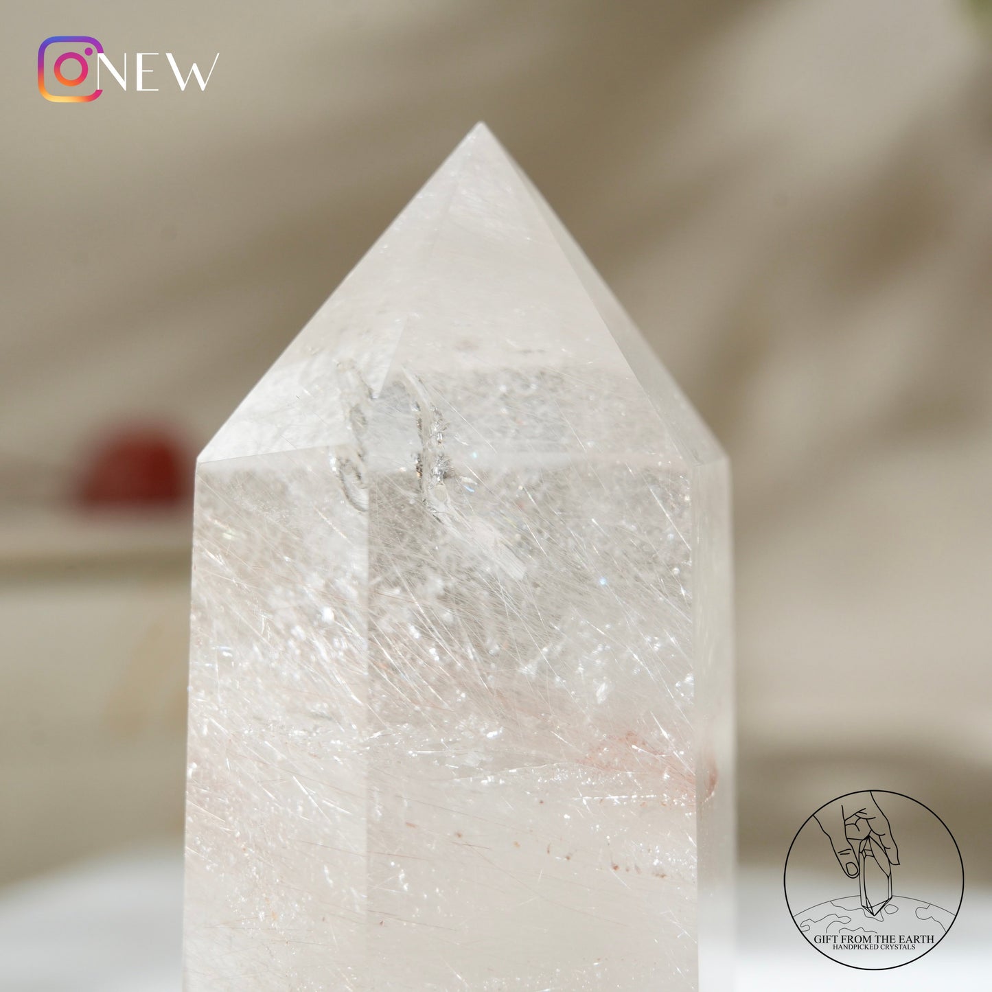 Silver rutilated quartz point