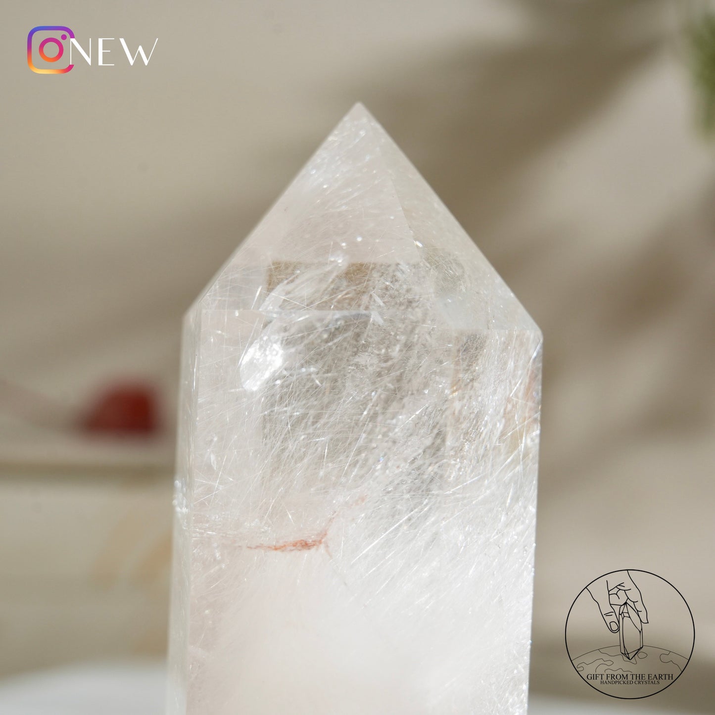 Silver rutilated quartz point