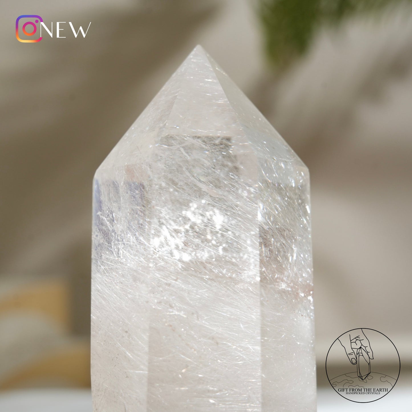 Silver rutilated quartz point