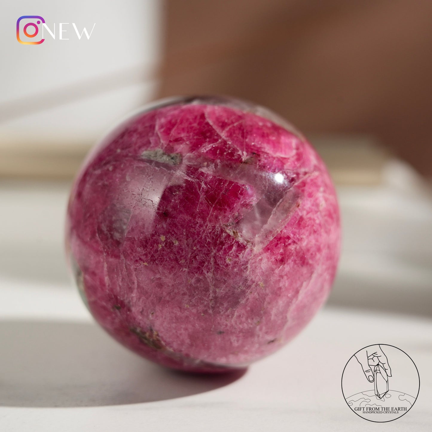 Zimbabwean rhodonite sphere