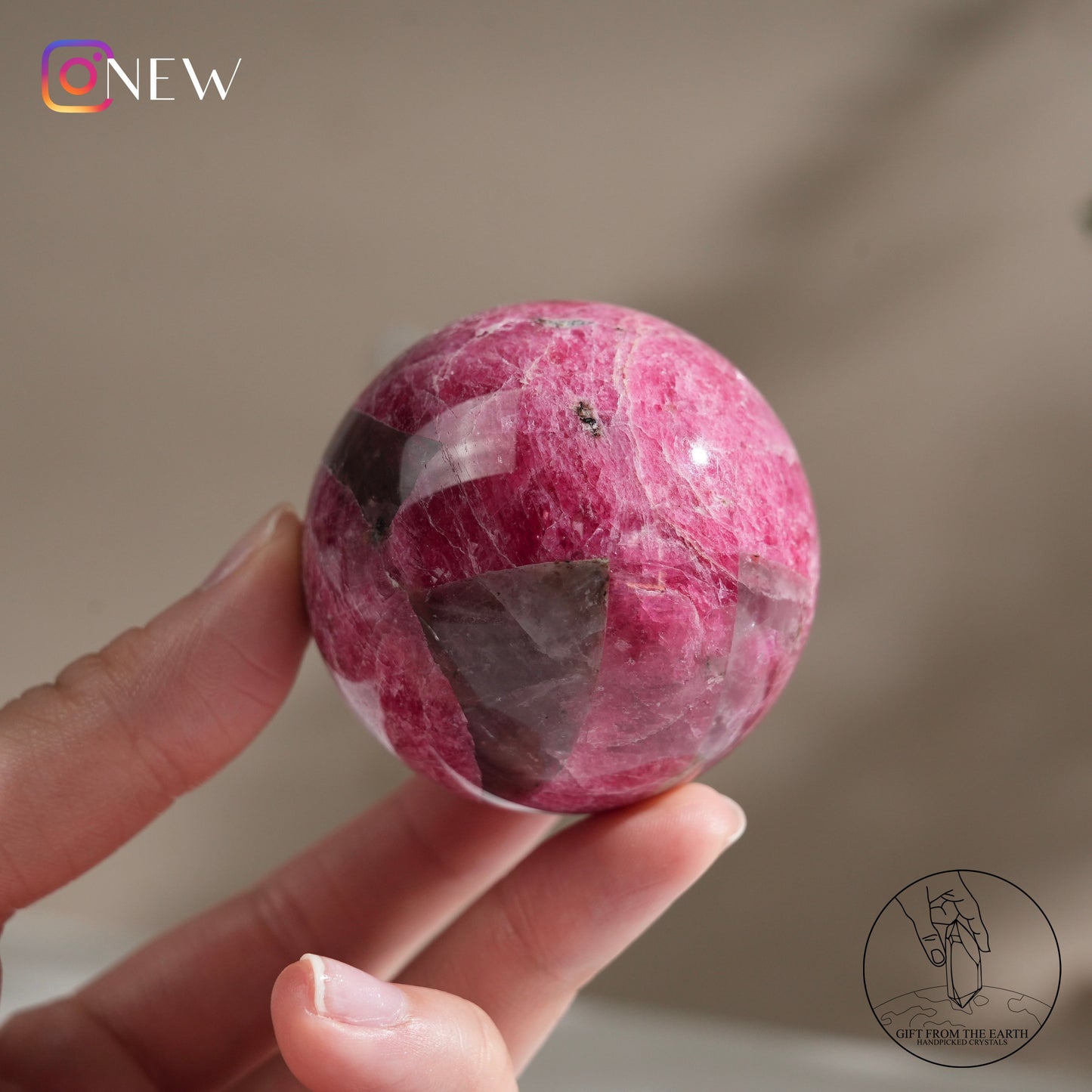 Zimbabwean rhodonite sphere