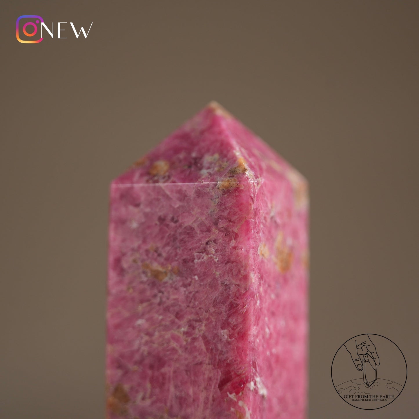 Zimbabwean rhodonite point