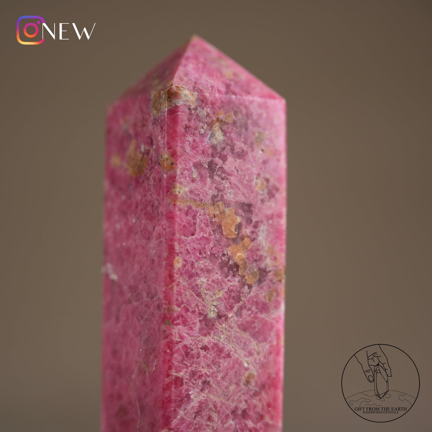 Zimbabwean rhodonite point